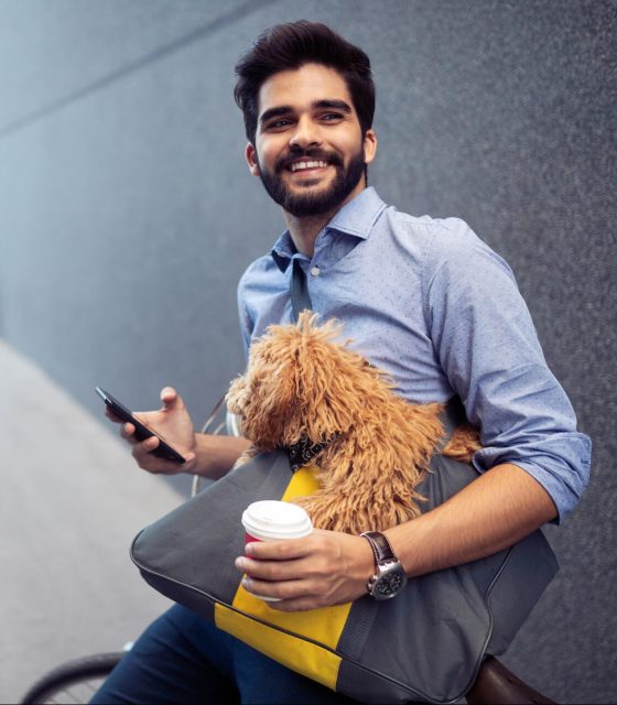 happy-handsome-man-with-bicycle-using-mobile-outdo-2021-08-26-17-33-37-utc-e1668145171383.jpg