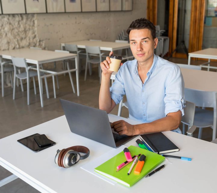 happy-young-confident-man-working-on-laptop-sitti-2021-08-30-13-51-40-utc.jpg